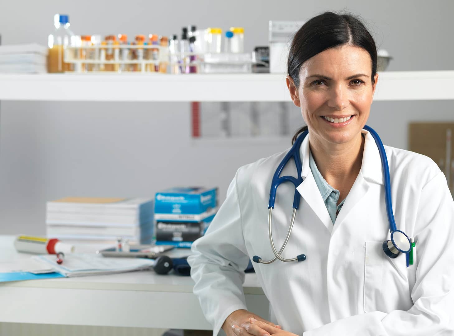 Doctor at desk awaiting patient