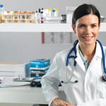 Doctor at desk awaiting patient